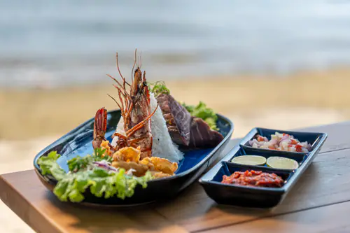 Grilled seafood platter with prawns and sambal