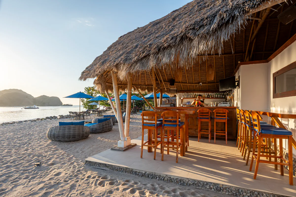 Beach Bar seating on the sand at Komodo Resort