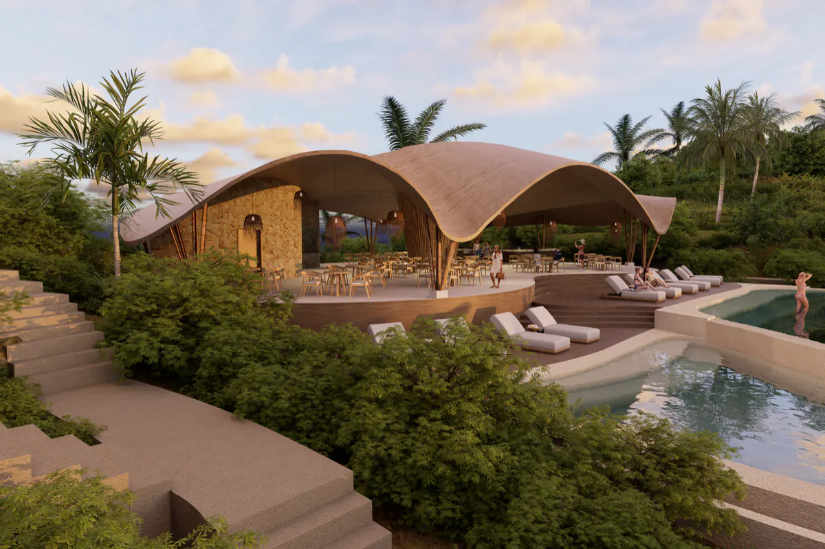The curved timber roof of the Hilltop Komodo Resort restaurant above the pool