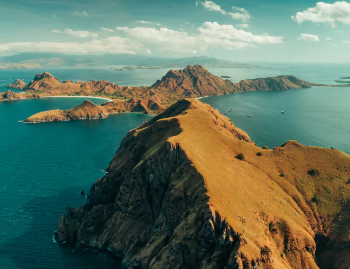 Aerial view of Komodo National Park cliffs and ocean channels